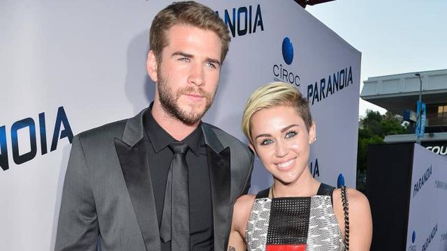 1280_miley_cyrus_liam_hemsworth_getty_ren640
